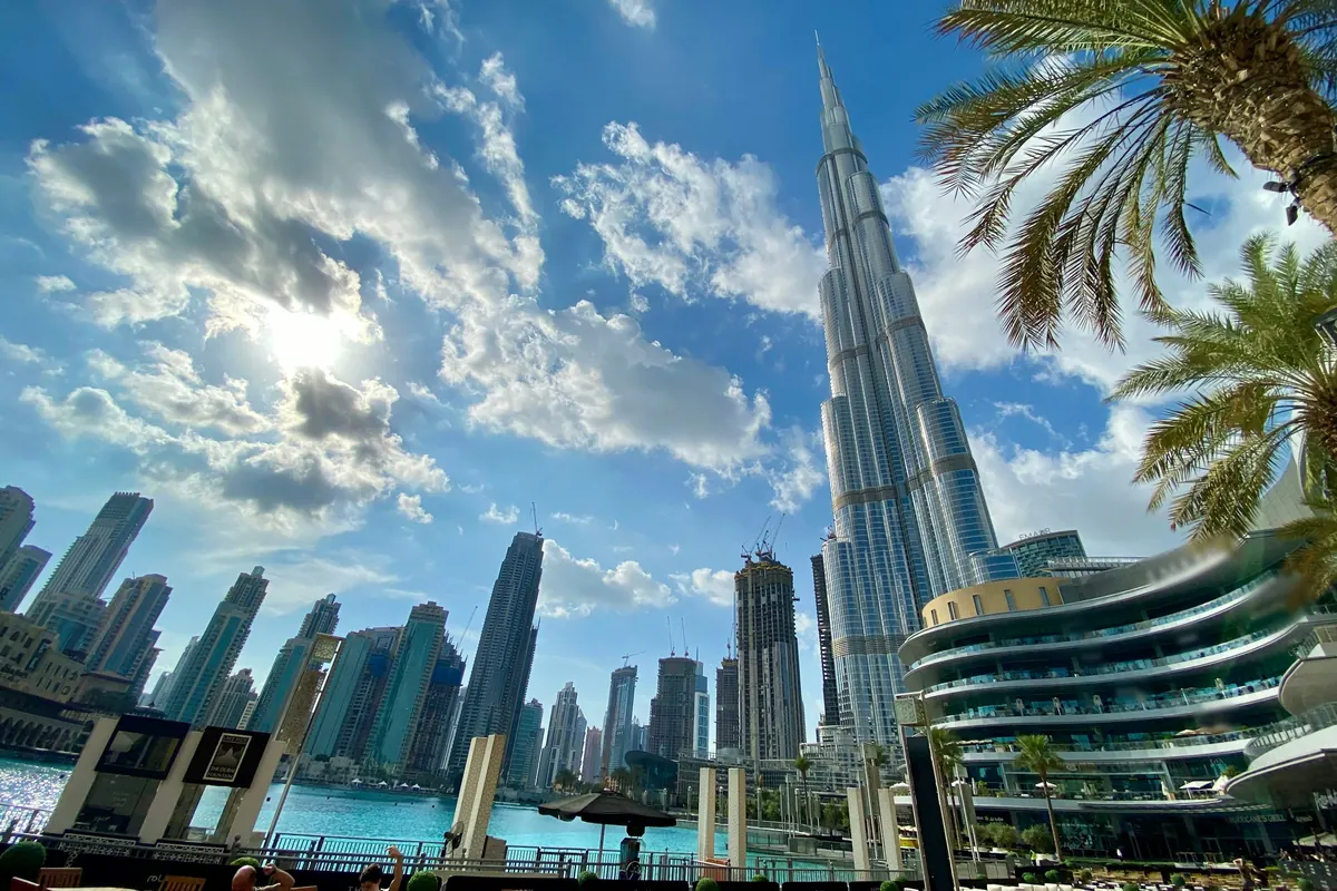 The Burj Khalifa above palm trees in Downtown Dubai